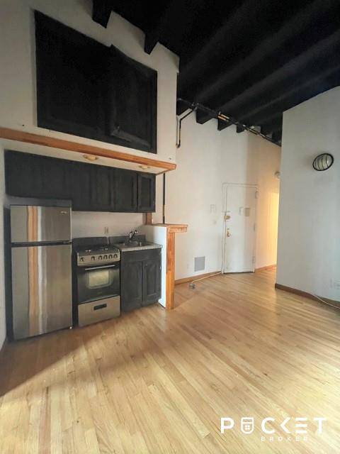 Large 2 bedroom with 10 ft high ceilings only steps from Union Square !