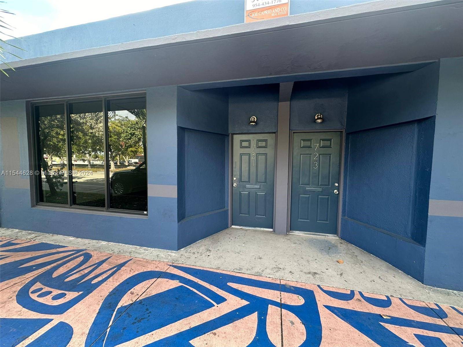Welcome to this exceptional commercial space in East Hollywood, FL, Situated facing Dixie Hwy in a mixed use district, this office space boasts a prime location with high visibility.