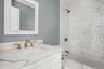 Full bathroom with vanity and shower / bath combination