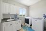 Laundry room with large pantry to left of picture off kitchen