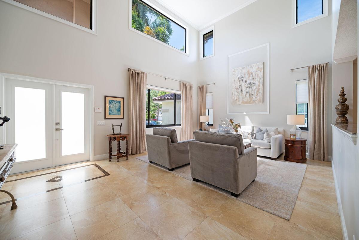The same upgraded neutral tile throughout 1st floor
