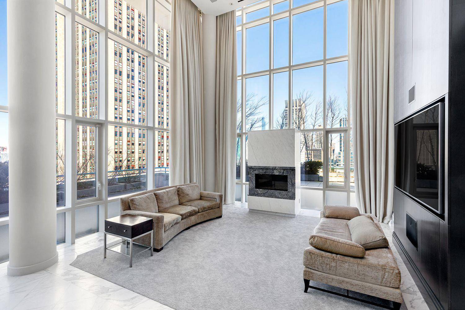 STUNNING, ONE OF A KIND PENTHOUSE A A APARTMENT FEATURES Dazzling views to the north, east and west from this serene retreat floating high above midtown Manhattan.