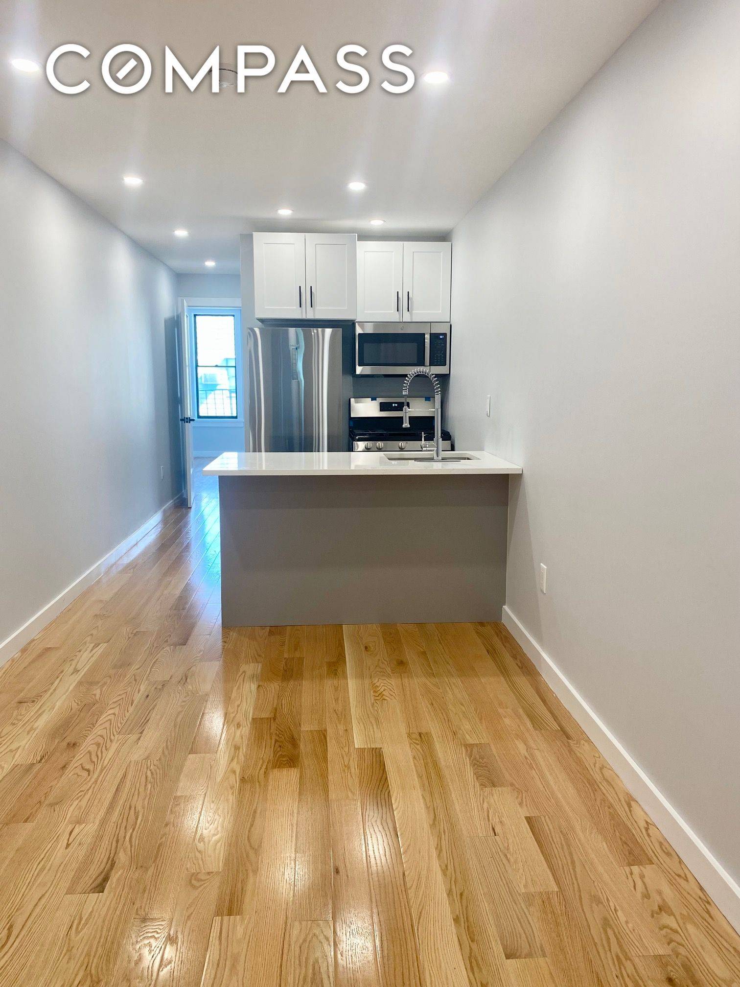 Move into a gut renovated two bedroom two bath apartment by McGolrick Park.