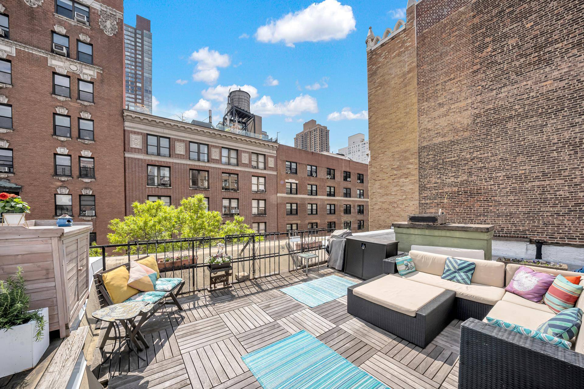 Dine al fresco and enjoy the change of seasons on your own spacious private roof deck !