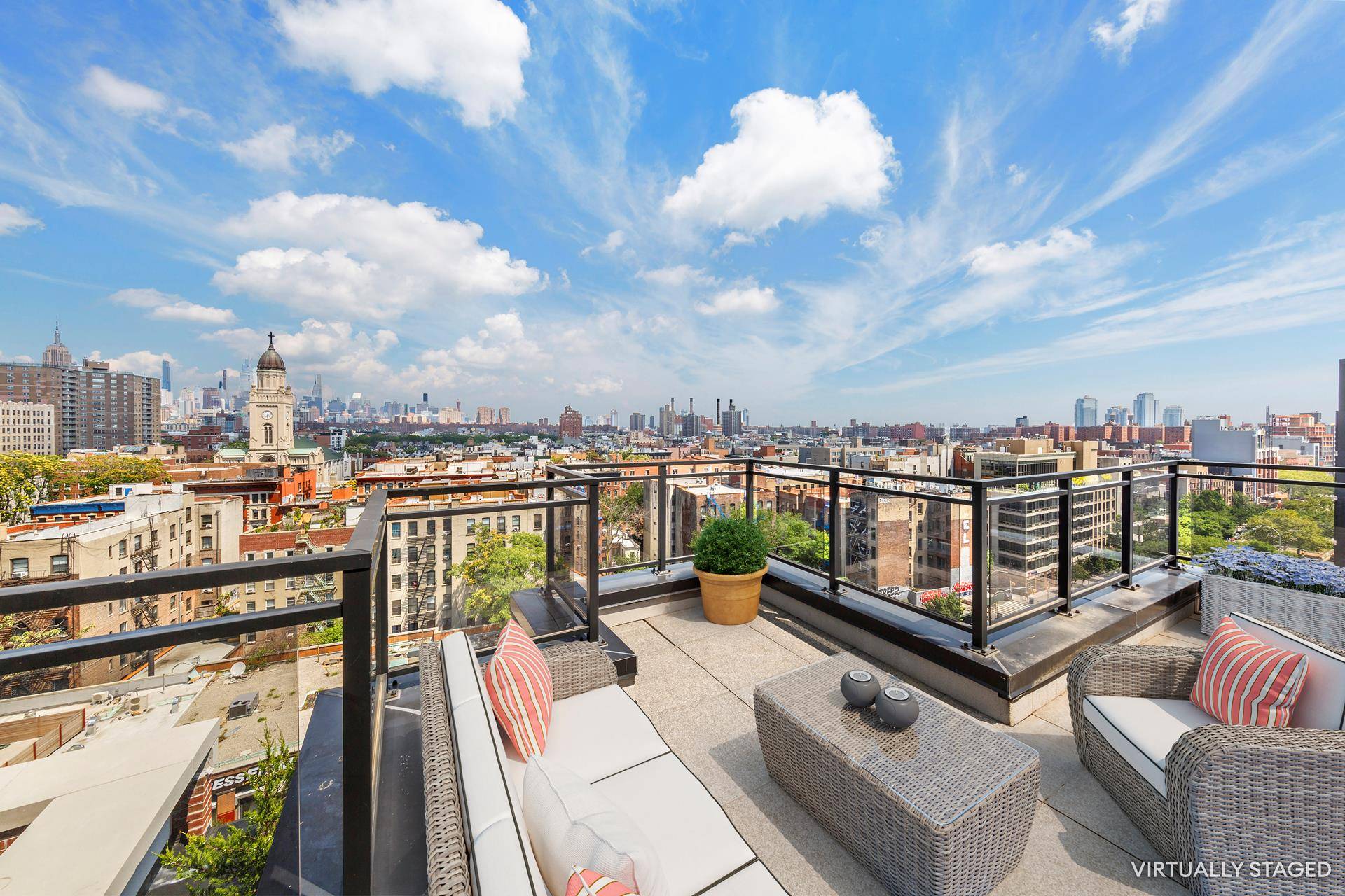 Penthouse Perfection with Three Private Terraces and Skyline Views !