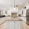 Digitally Enhanced to show what painting the cabinets white would look like.