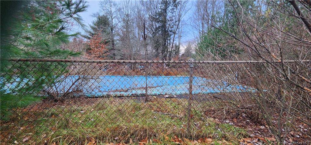 Rare find 7 acres with the municipal water and sewer in the Swan lake area.