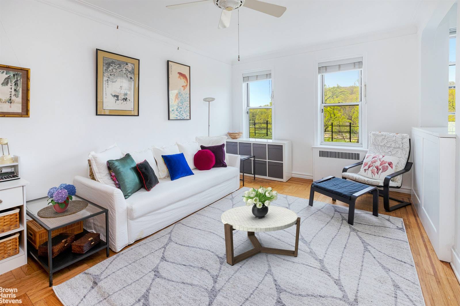 This renovated, commuter friendly, park facing Inwood 1 bedroom is full of sun and magic.
