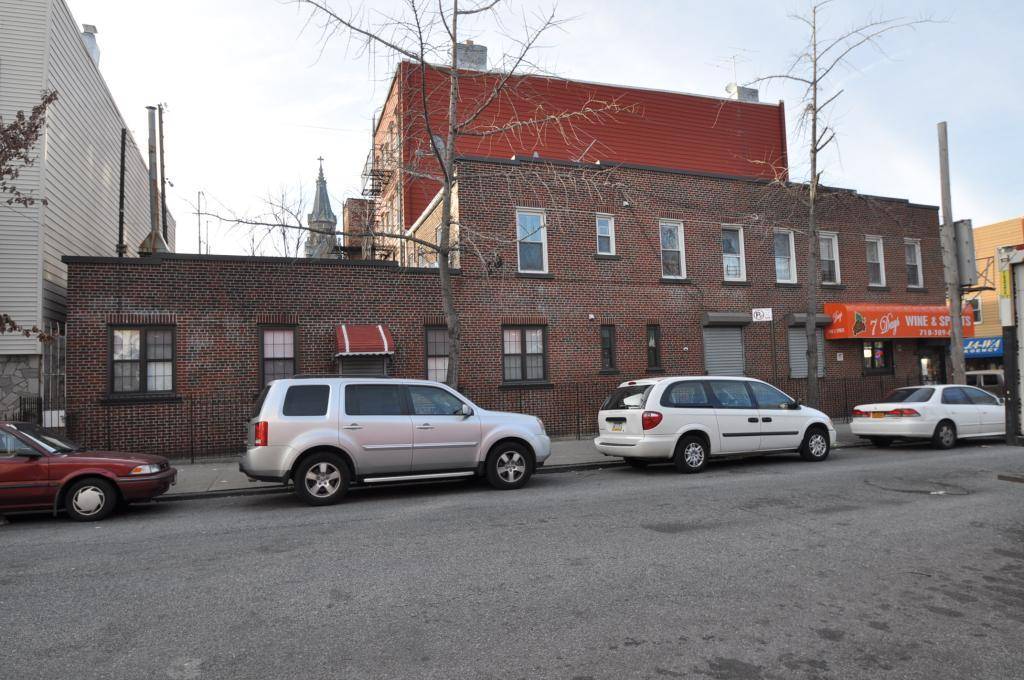 Brick, corner building, legal 3 Family with a commercial space, located across from McGolrick Park.