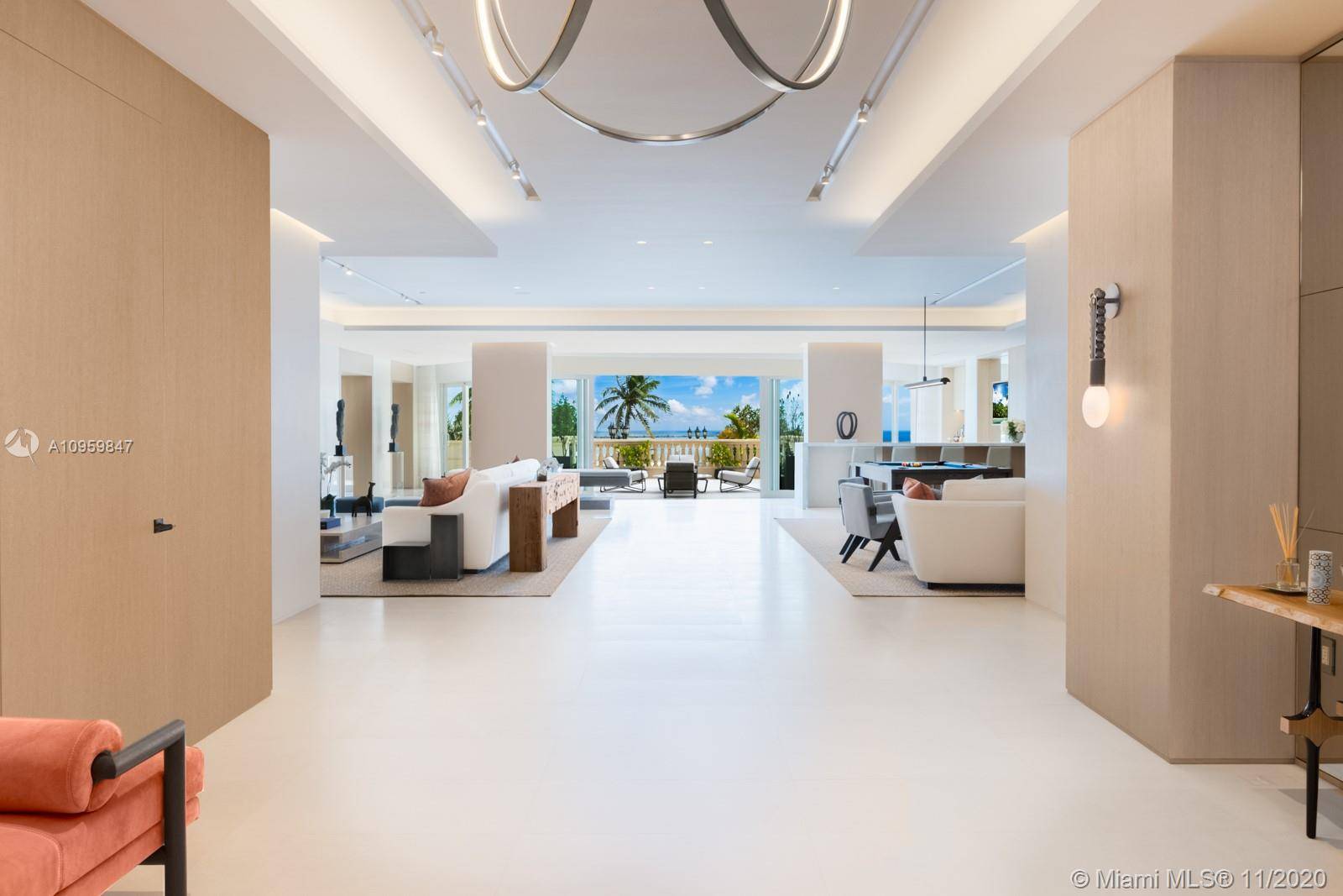 Encompassing over 12, 000 Square feet of interior and exterior living space on exclusive and prestigious Fisher Island.