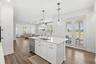 Kitchen view into Open living space