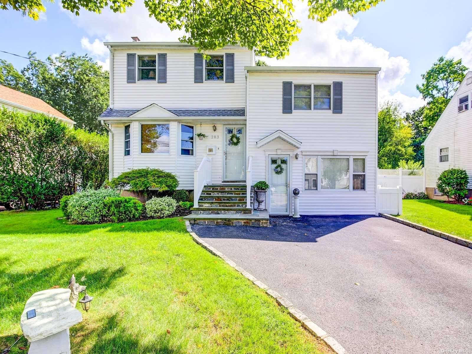 Welcome to this beautifully maintained home in Massapequa School District 23.