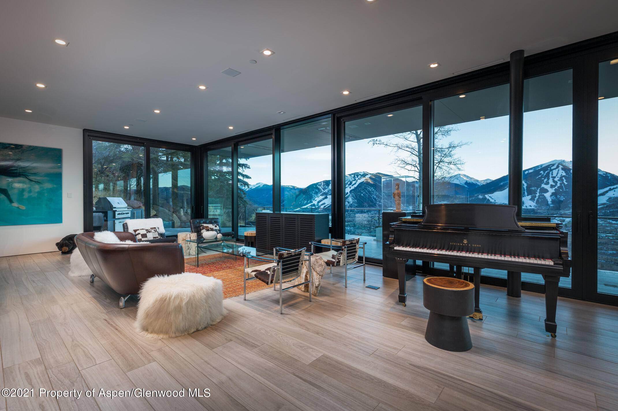 This spectacular, ultra modern, mountain top estate was completed in 2018 and has unobstructed, panoramic views of all four ski areas and the Continental Divide.