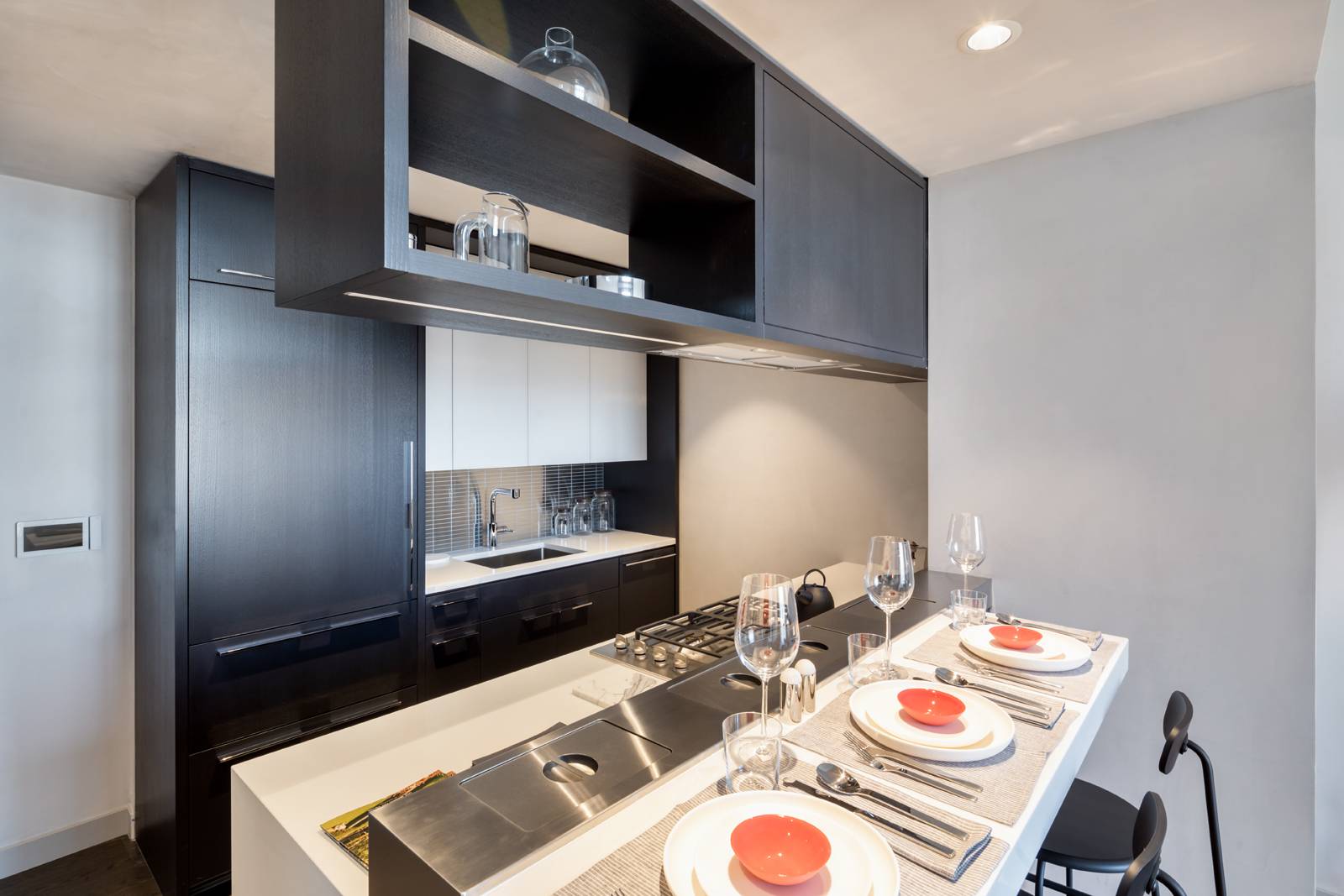 Residence 9G is a 723 square foot one bedroom, one bathroom with an open gourmet kitchen and breakfast bar.