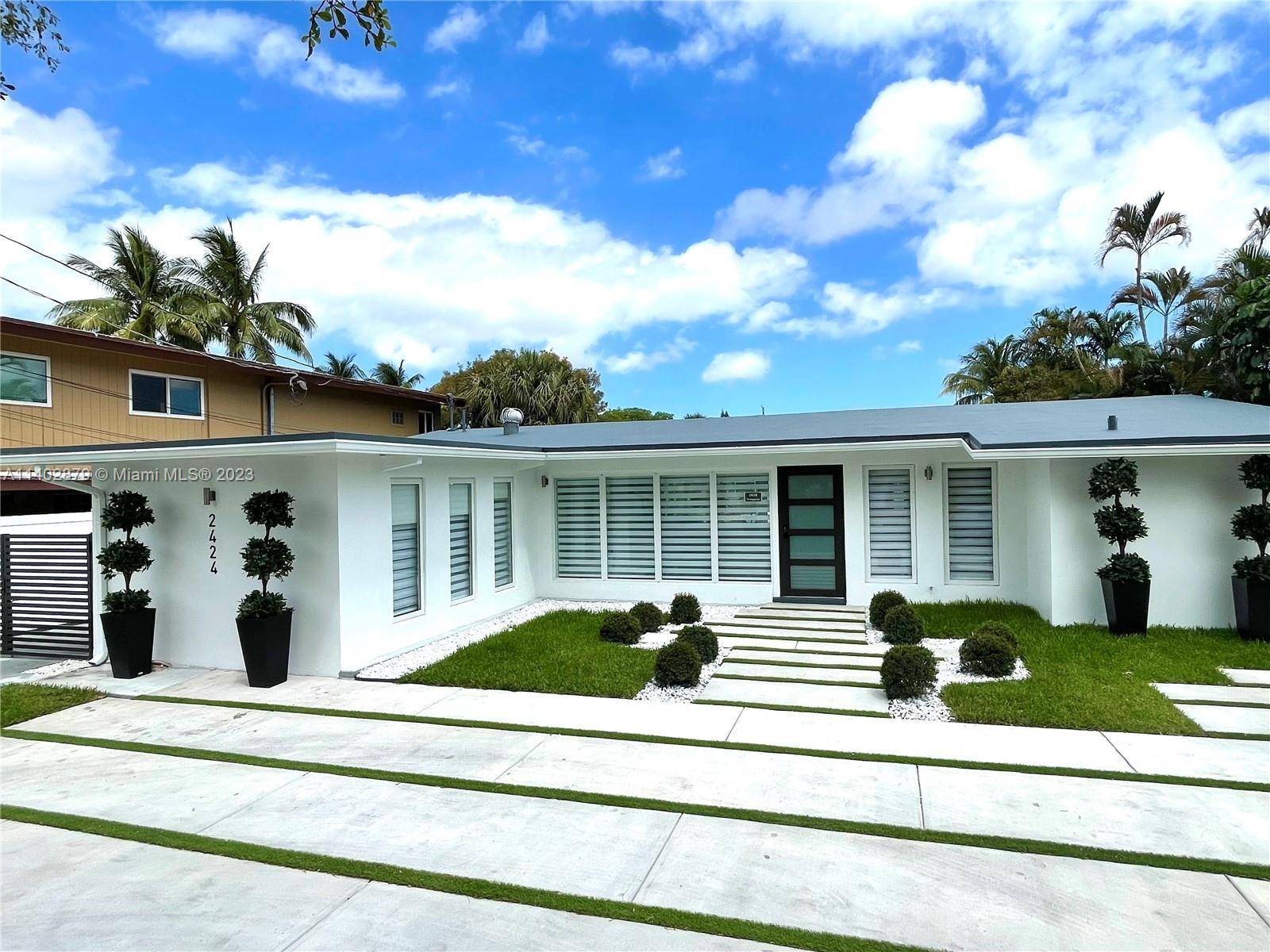 Beautiful waterfront home PROFESSIONALLY REMODELED in the community of Lauderdale Isles.