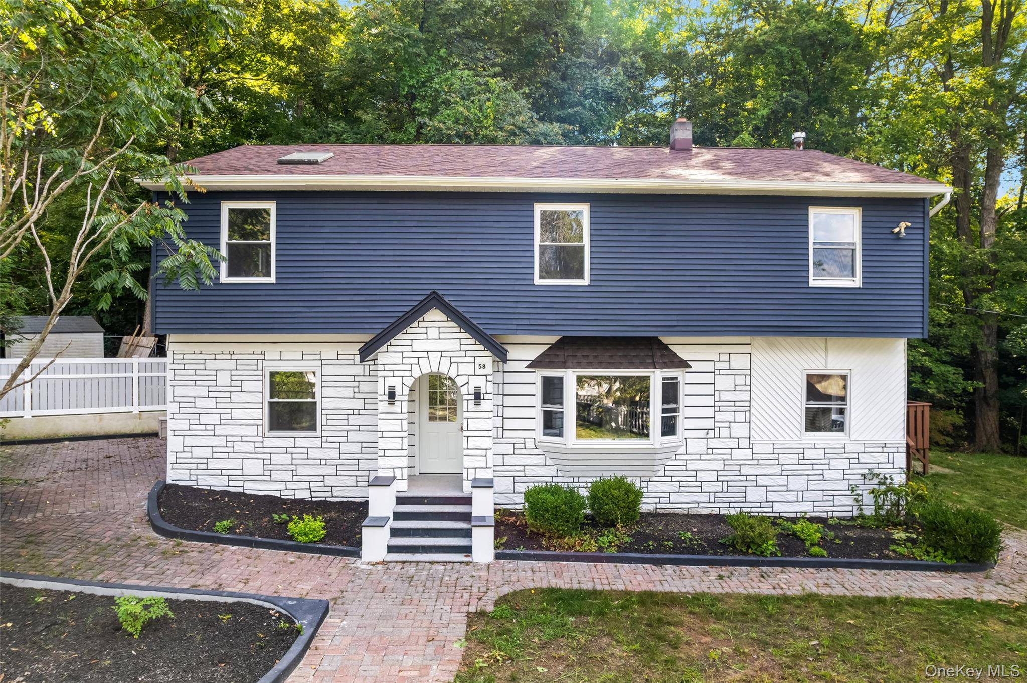 Welcome to your dream home in the heart of Greenwood Lake !