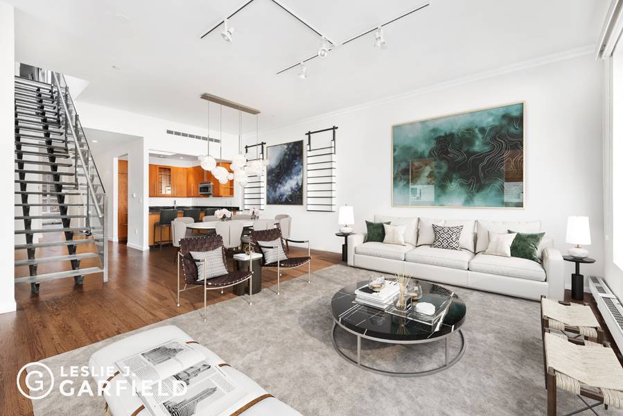 The Penthouse at 237 West 26th Street offers the opportunity to live in a turnkey two bedroom two gracious bedrooms with a third flexible space upstairs perfect for a home ...