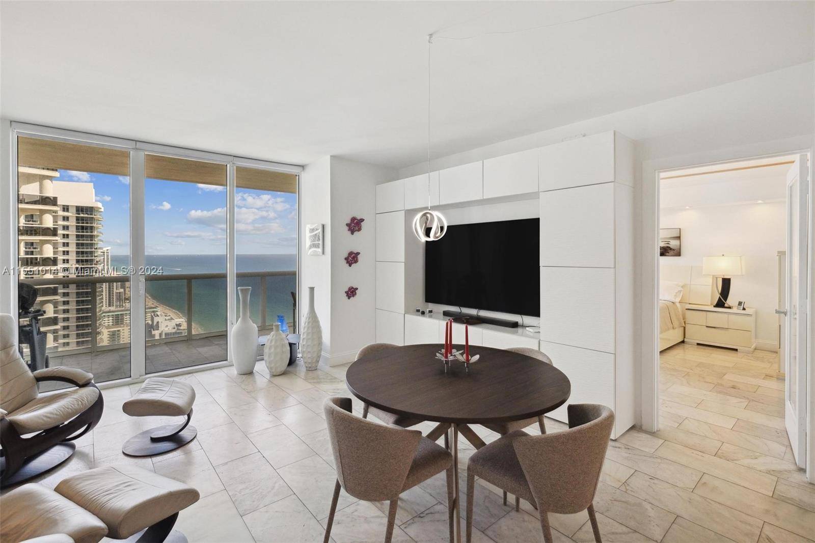 Immerse in unparalleled sophistication in this upgraded unit, offering breathtaking ocean intracoastal views.