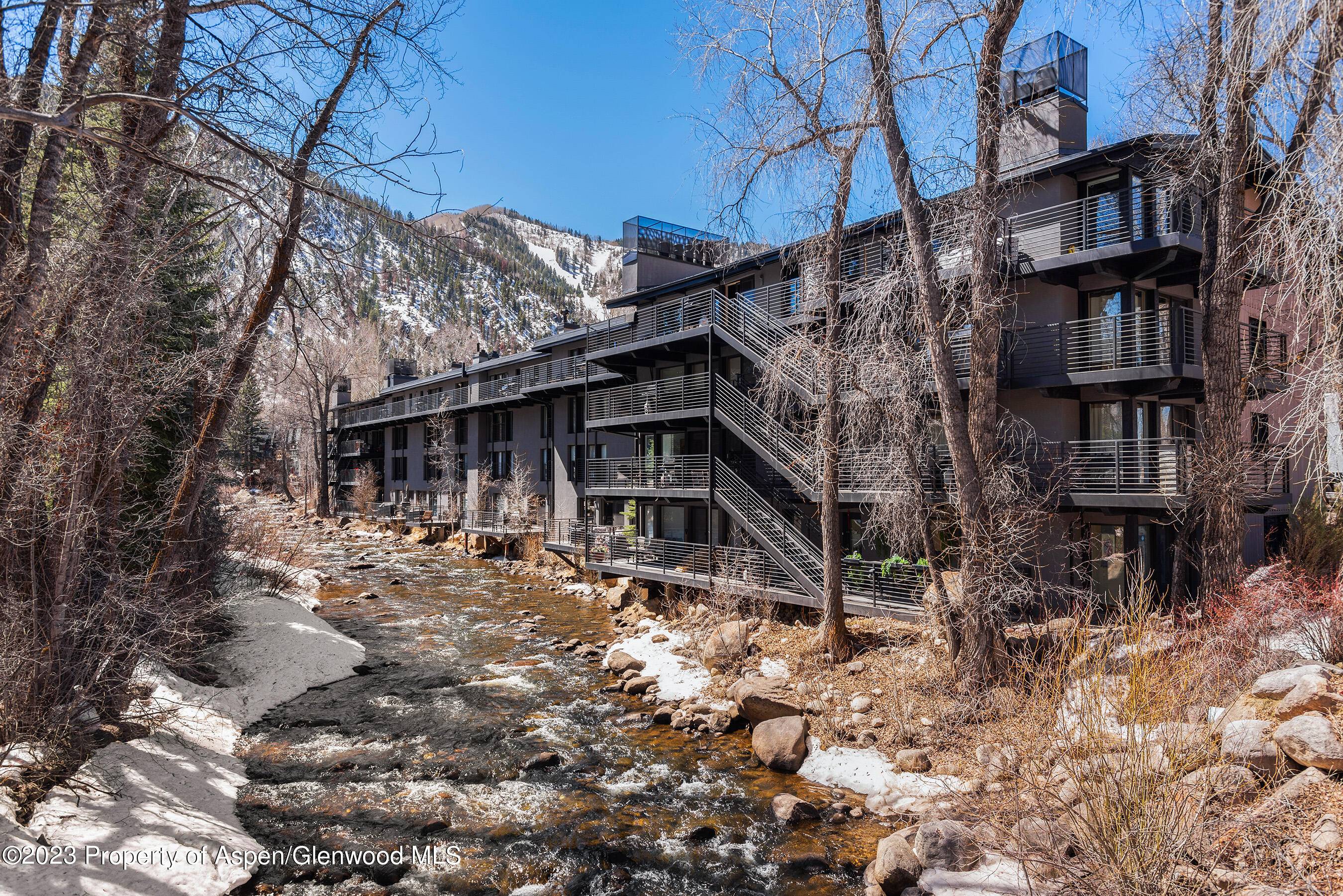 This beautiful four bedroom condo in the Core boasts amazing views of the roaring fork river.