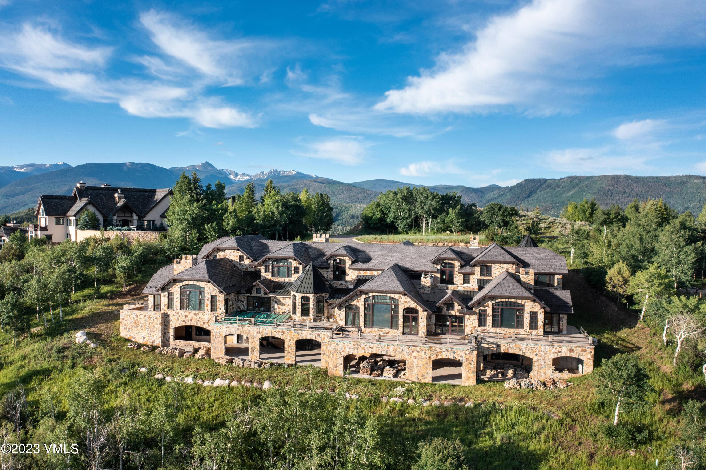 Located at the crown of the Cordillera Divide is a one of a kind opportunity for a tremendous mountain estate INTERIOR is framed and sold NOT finished.