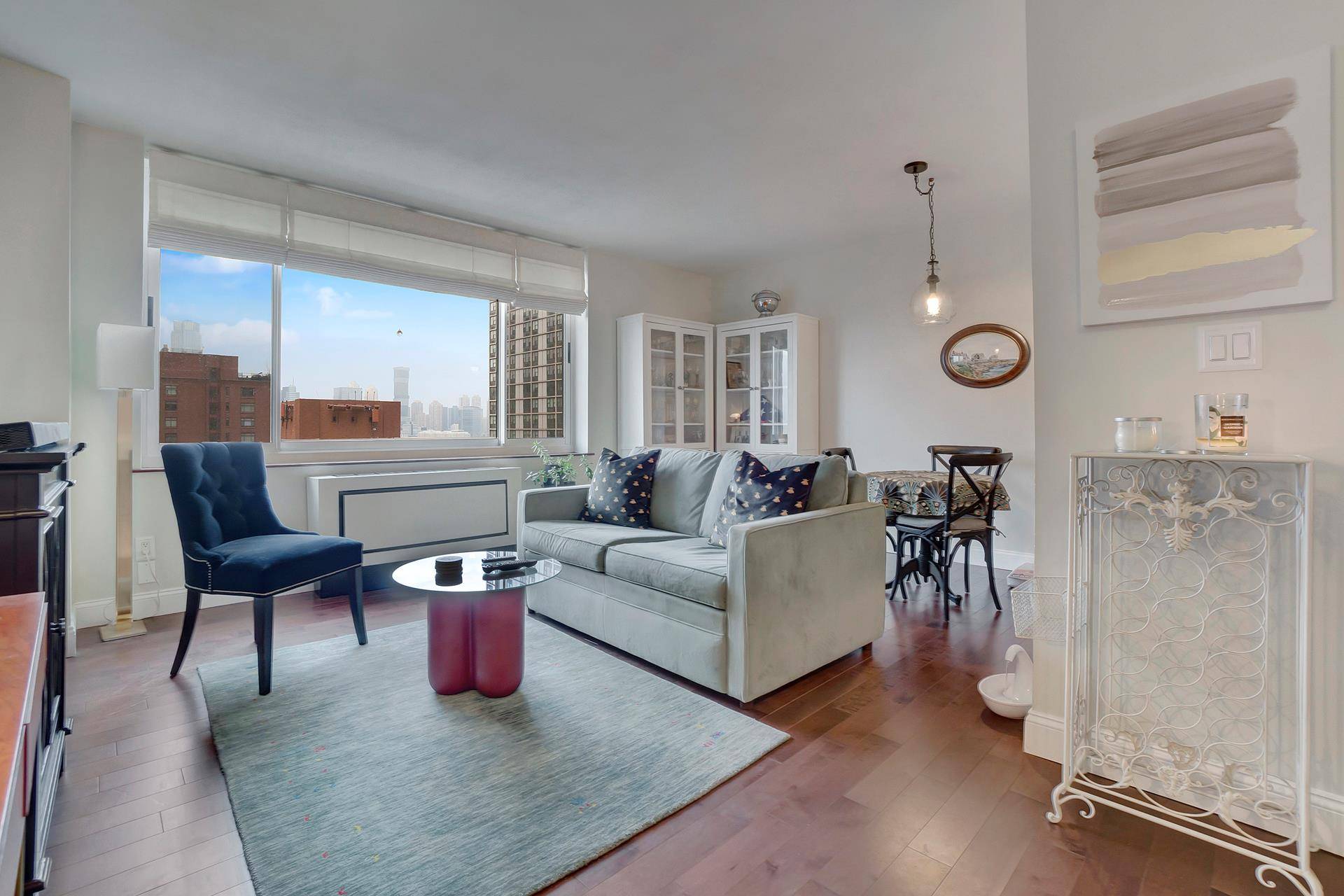 This breathtaking, gut renovated Battery Park City residence is flooded with sunlight and has direct south west views of the Hudson River and Statue of Liberty !