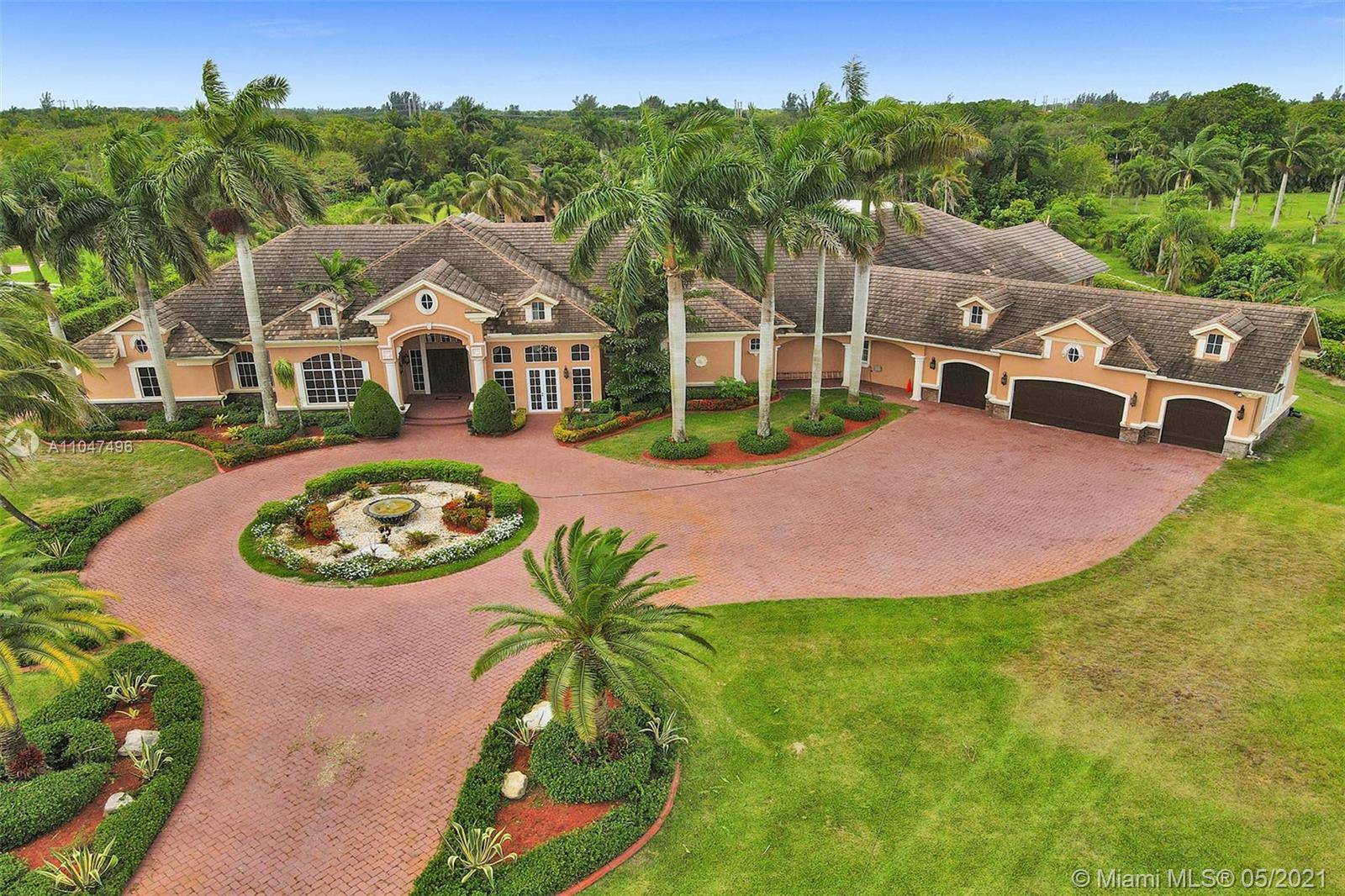 Luxurious 11, 772 sq. Ft ranch style home located on 3.