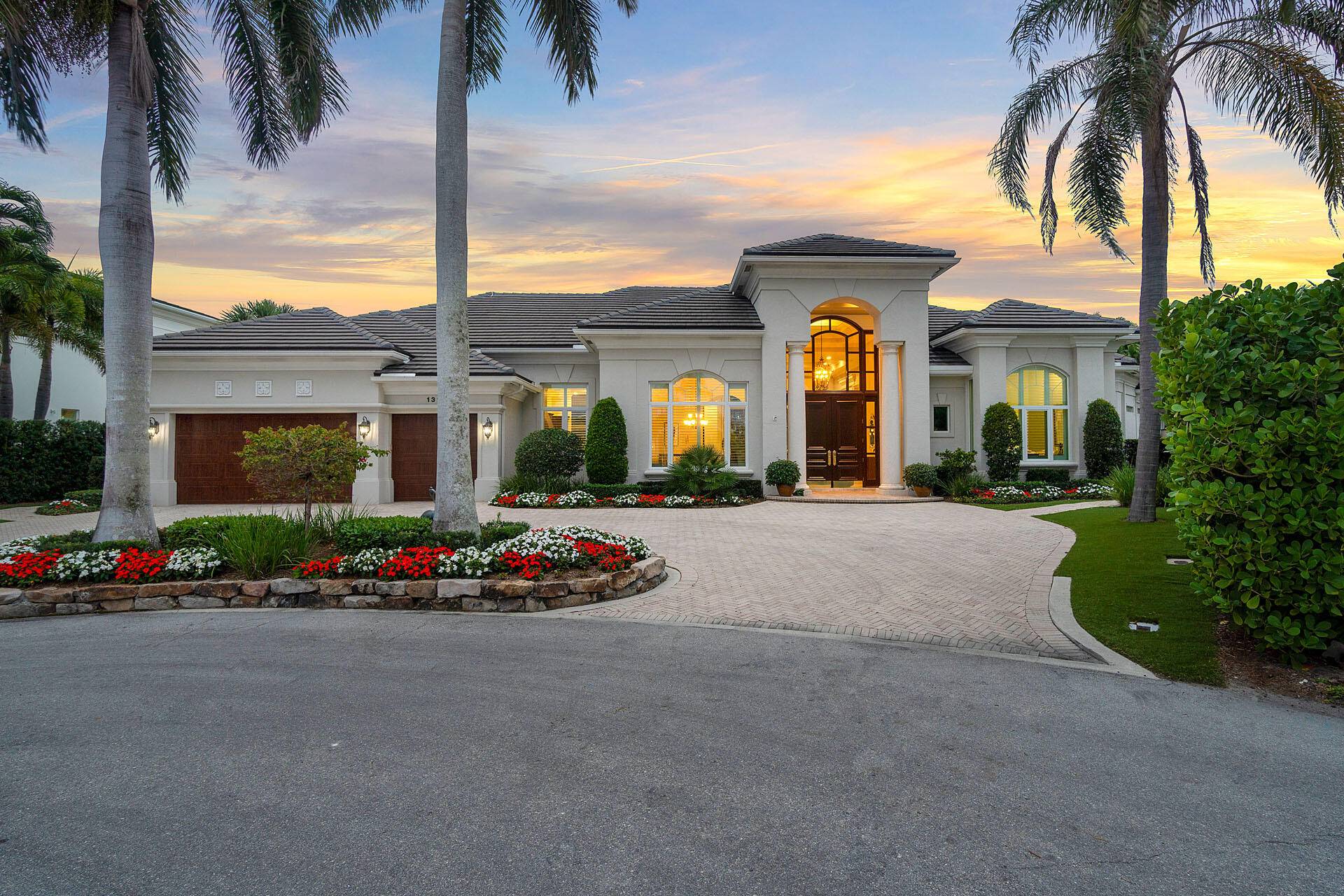Welcome to 132 Thatch Palm Cove, single story home on a quiet cul de sac in the prestigious Royal Palm Yacht Country Club.