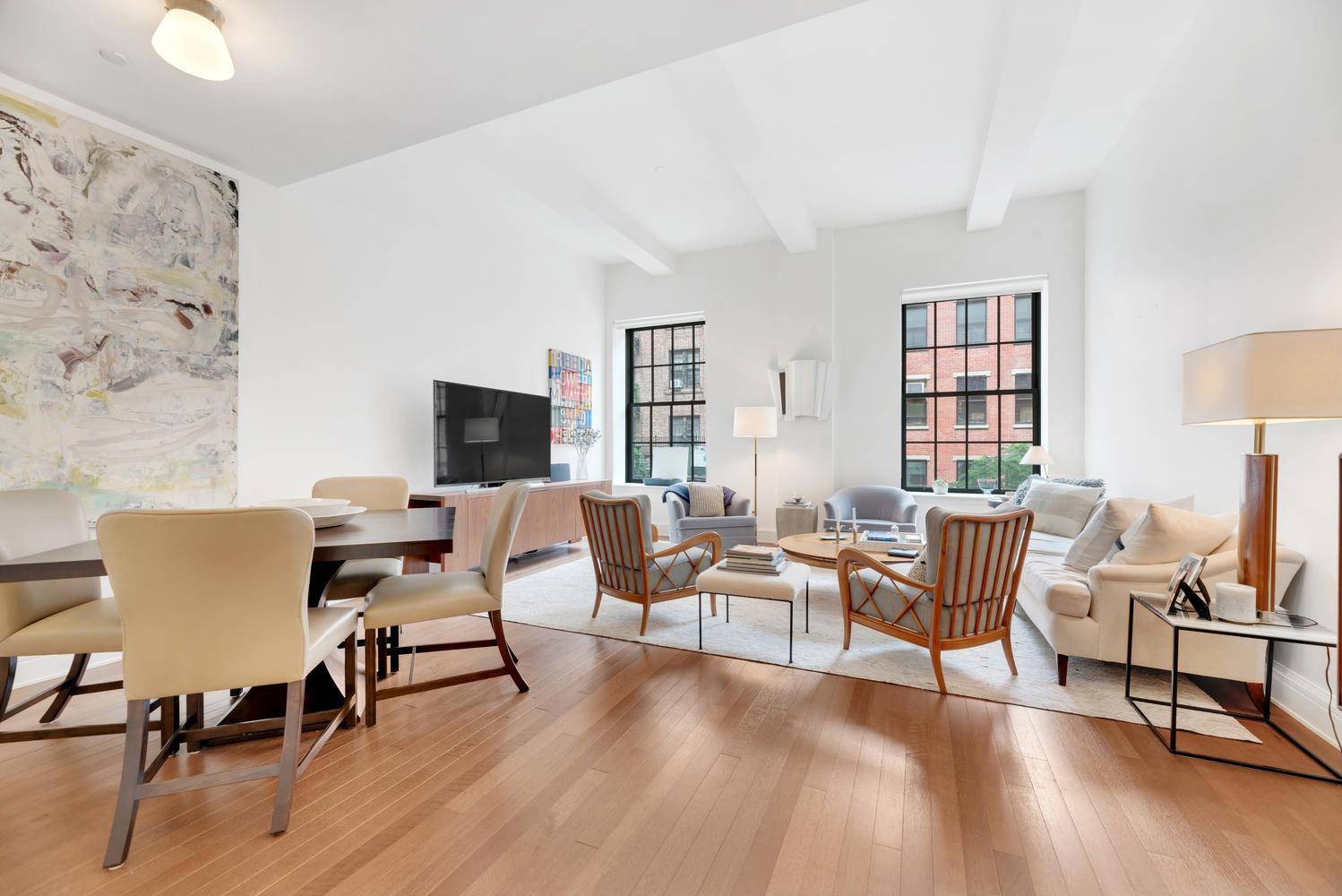 Nestled in the heart of the West Village and located in The Greenwich Lane Condominium this loft like 1, 535 square feet, 2 bedroom 2 bath residence is simply stunning.