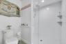 Bathroom featuring a walk in shower