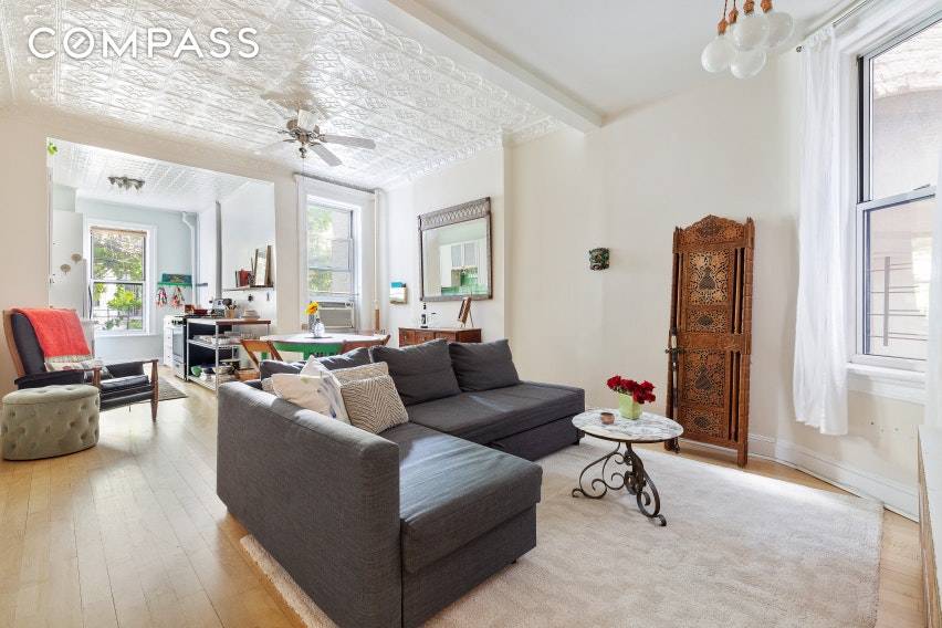 This charming two bedroom Co op on the tree lined street, Garfield Place, is perfectly situated steps from diverse restaurants and shopping on 7th Avenue in Center Slope.