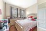 Bedroom with dark carpet