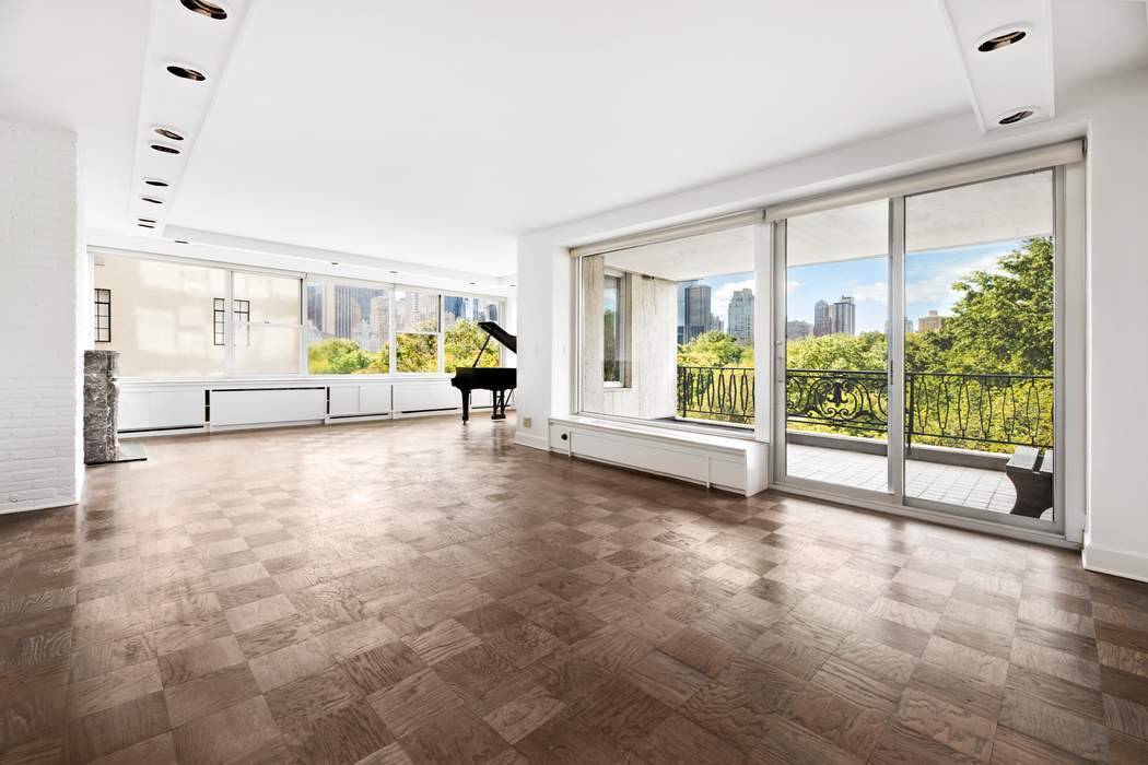 Full floor residence boasting SPECTACULAR above tree line Central Park views.