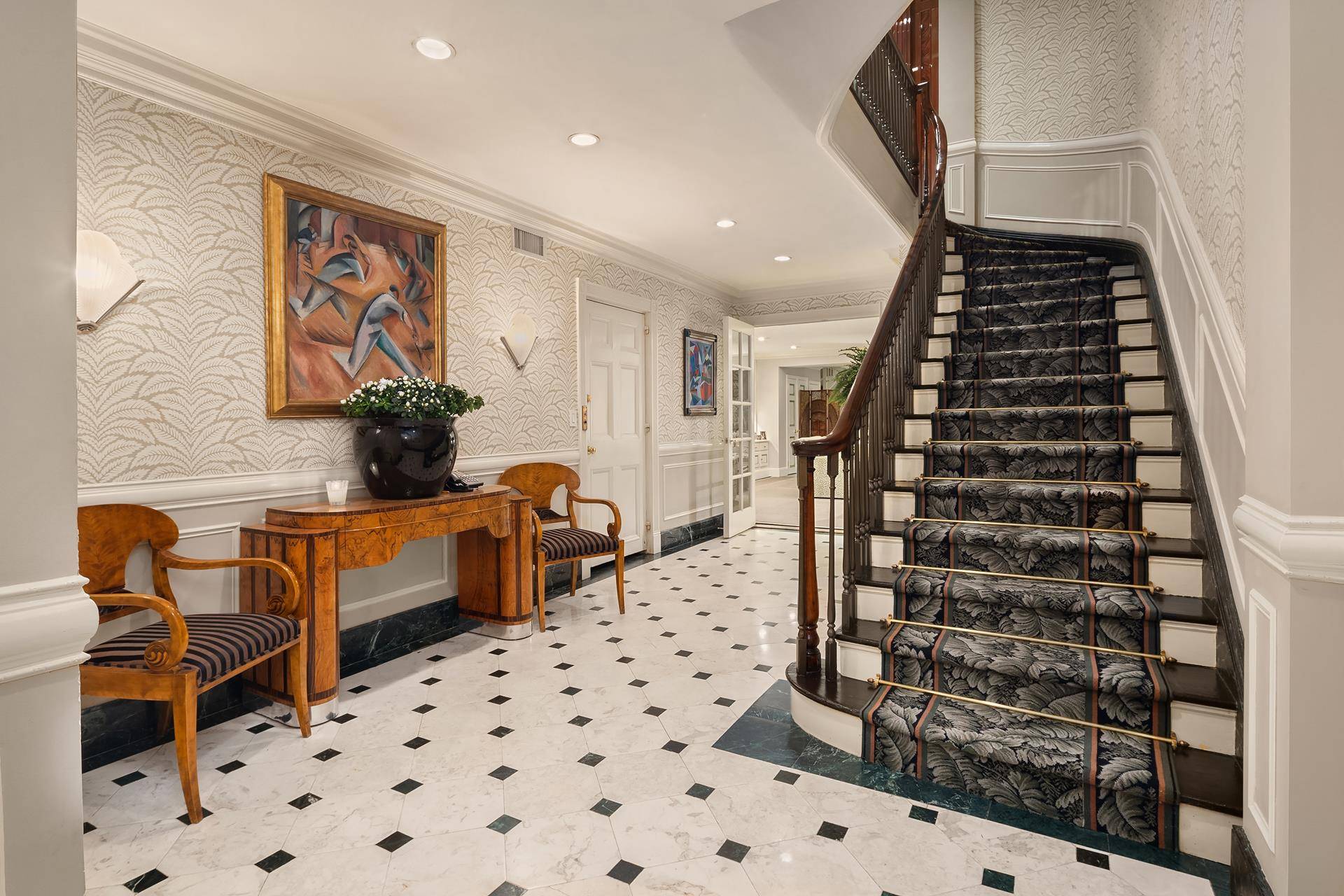 53 East 80th Street is a spectacular 22' wide, 6 story single family townhouse with 14 rooms, 7 bedrooms, 7 full bathrooms, 7 fireplaces, 2 powder rooms and elevator.