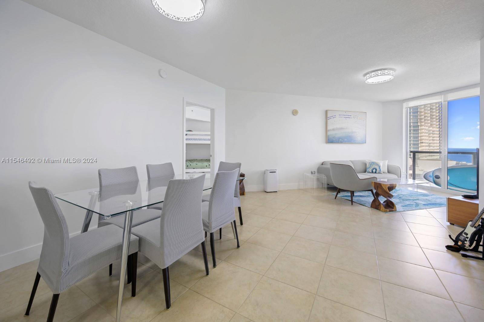 Turnkey unit located in the heart of Sunny Isles, enjoy resort style living in a large 2 bedroom DEN, 2.