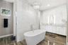 Primary Bathroom; Long separate Counters, Extra Large Soaking Tub and Shower Room.