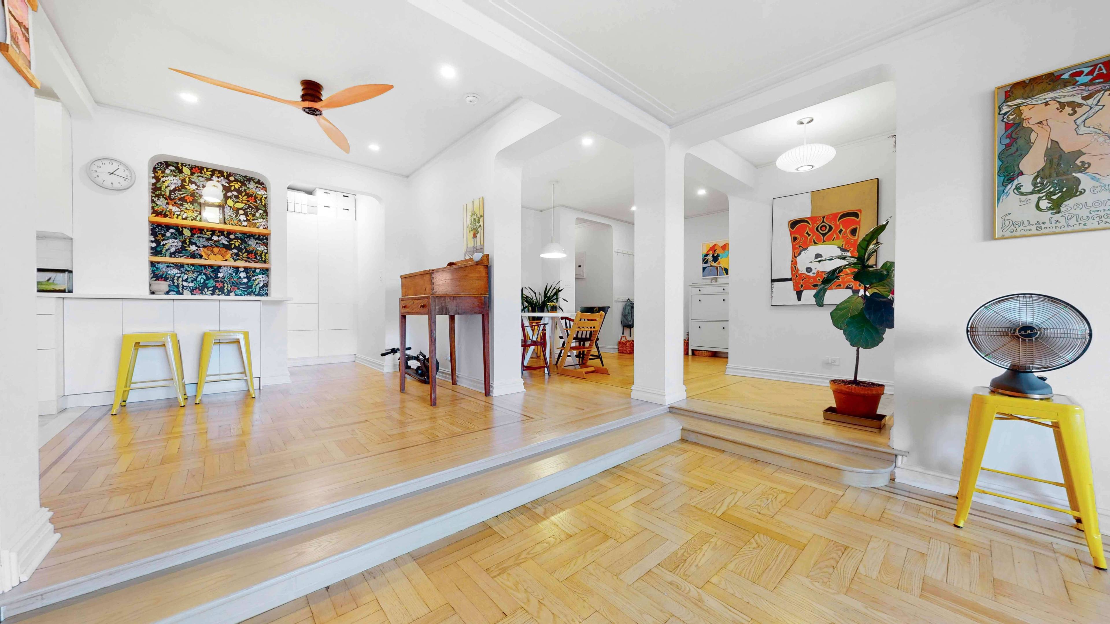 Located on a leafy street at the edge of Isham Park is a huge and sunny residence with three bedrooms, two full baths, and bonus living spaces.