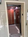 Property entrance featuring elevator