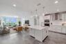 Perched on the 7th floor of Marina Bay 880, this 3-bedroom, 4-bath luxury penthouse-style residence showcases stunning panoramic views of the Intracoa