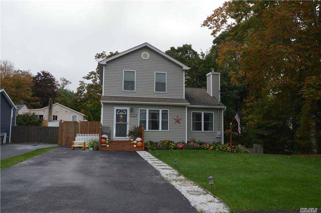 Beautiful 3 Bedroom 2 Full Bath Colonial Kitchen with Granite and SS Appliances Hard Wood Floors Raised Panel Doors Full Walk out Basement to Fenced Yard on Quiet Block