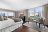 Primary Suite hosts a king size bed and space for a sitting area.