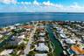 100 feet of waterfrontage situated on an 11,543 square foot lot