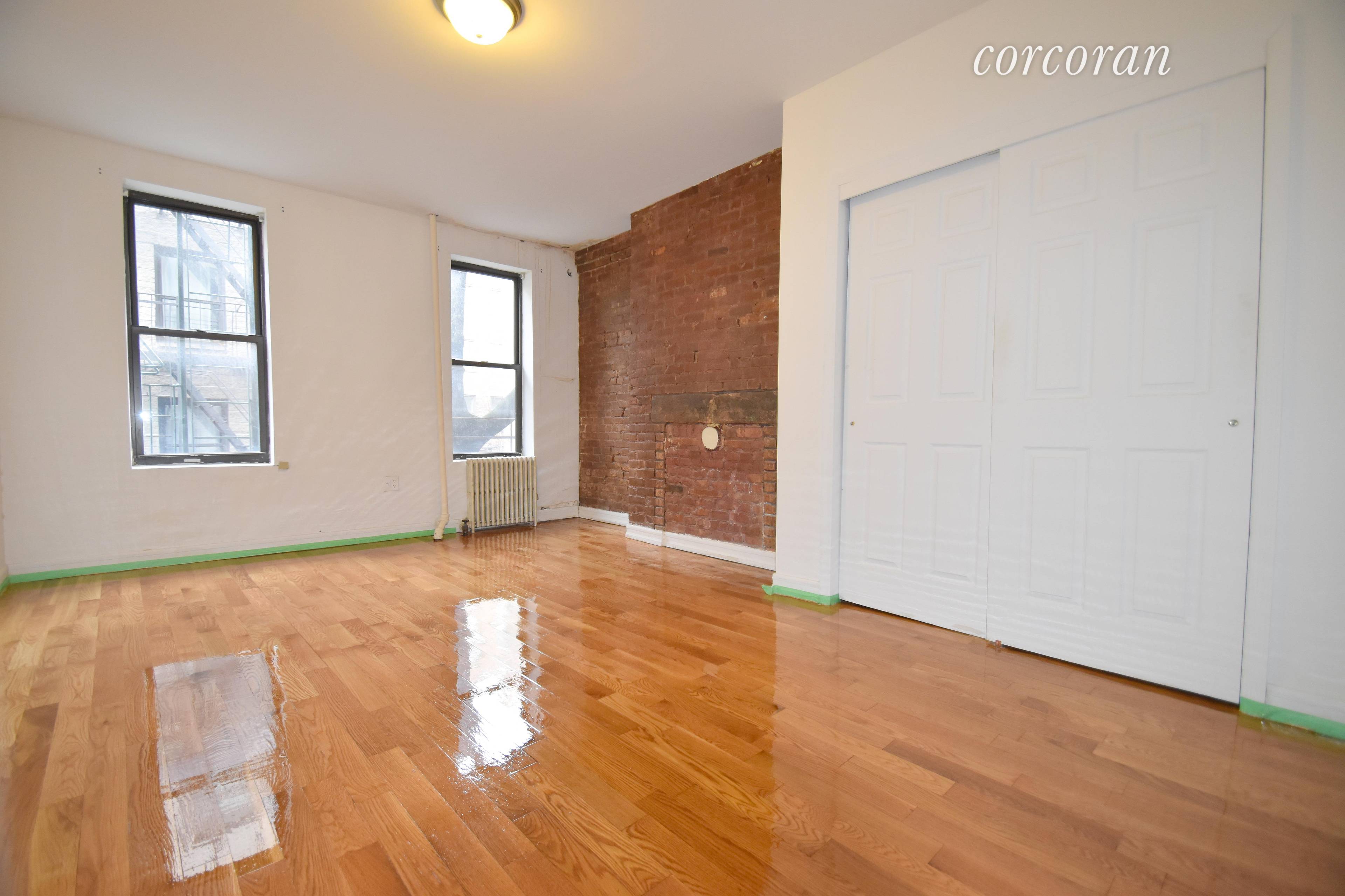 Prime East Village Location HUGE, FLOOR THROUGH one bedroom home boasts a fully equipped, separate SS kitchen equipped with a DISHWASHER and MICROWAVE ; a KING SIZE BEDROOM facing south ...