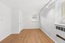 Bright bedroom #2 with luxury vinyl flooring and freshly painted