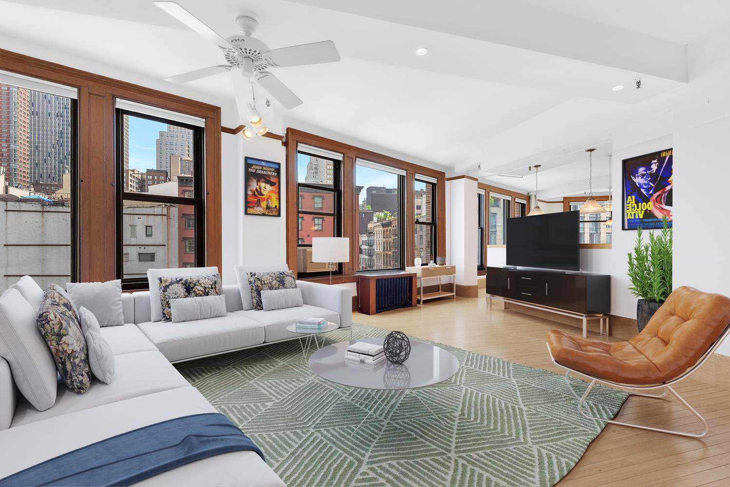Classic Tribeca full floor loft with the most spectacular light from 17 windows with views of Tribeca and the Downtown skyline from every room.
