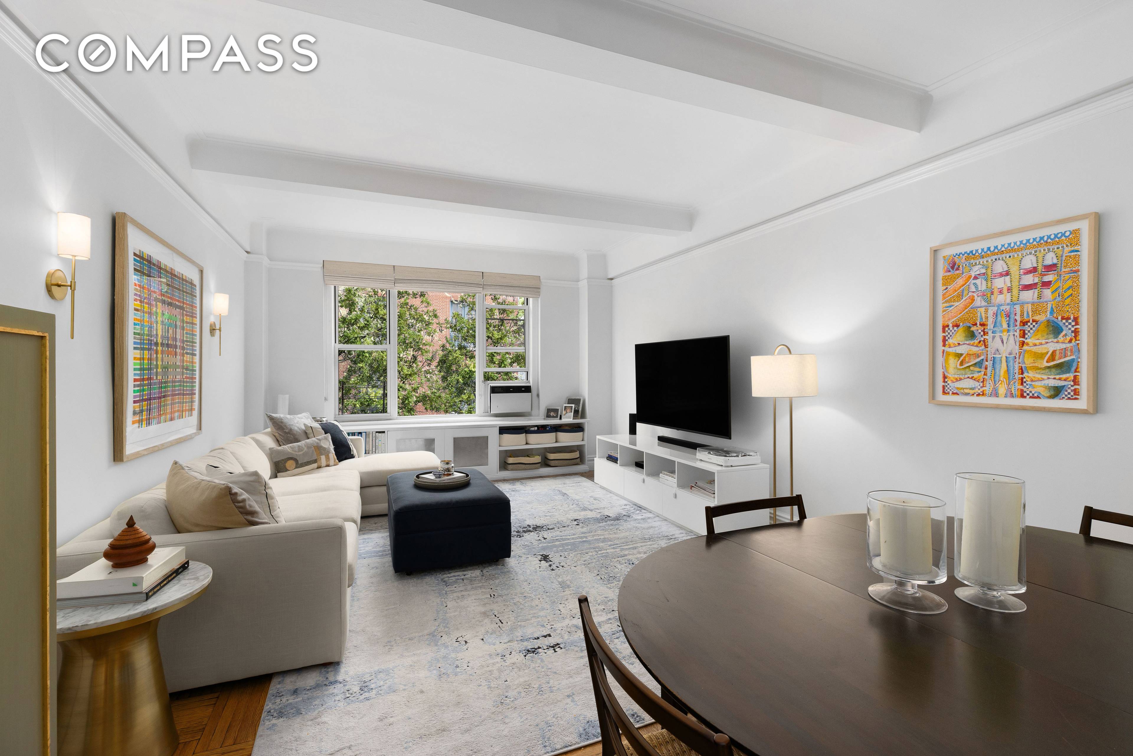 This light filled two bedroom gem in the heart of Carnegie Hill is characterized by fine prewar details and charming treetop views.