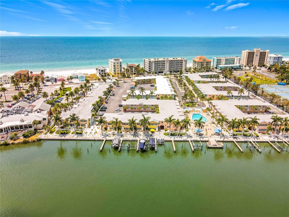Welcome home to your customized 2 bedroom, 1 bath direct waterfront condo sitting right on the Intracoastal Waterway at the Barefoot Beach Resort.