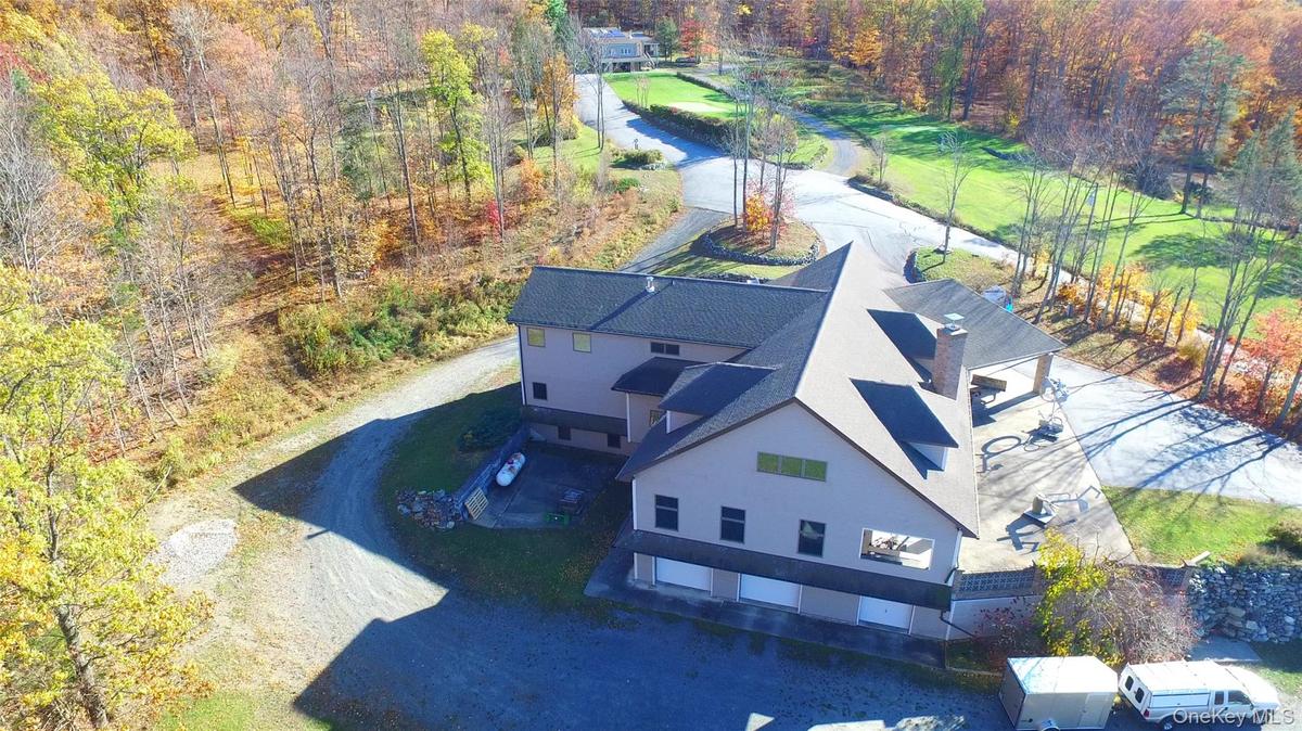 Plenty of garage parking including a massive concrete fireproof vault for storing valuables or additional storage.