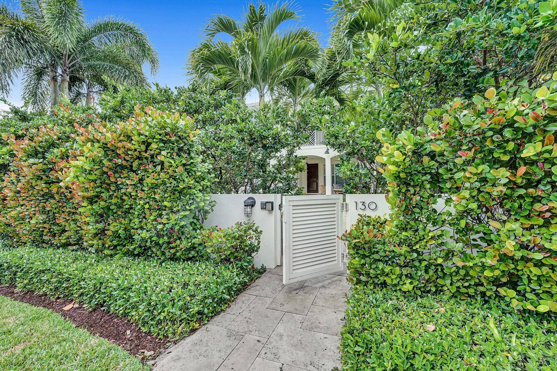 Custom courtyard residence, close to the ocean and within one block of downtown Delray Beach, invites indoor outdoor living with two tropically landscaped patio areas, one with a sun splashed ...