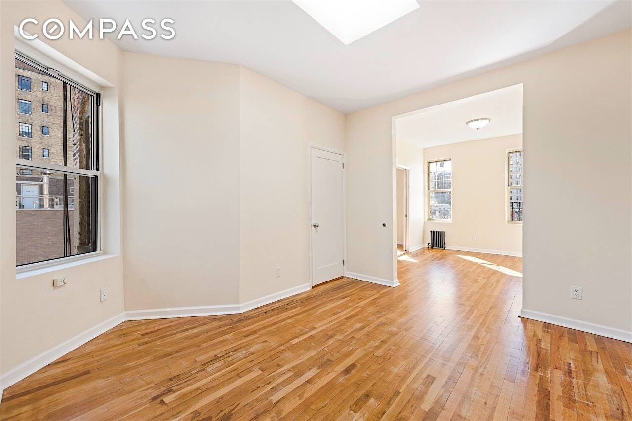 Gut renovated West Village 2 Bedroom with tons of sunlight, eat in kitchen, premium stainless steel appliances, skylight, new hardwood floors, newly tiled bath with a tub and glass enclosure, ...