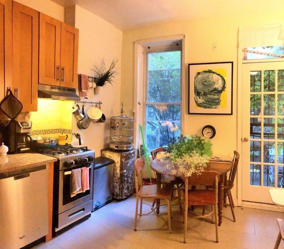 Renovated, Extra Room, Exclusive private Backyard Gorgeous First floor one and half bedroom apartment and lots of original details, renovated kitchen and a private backyard.